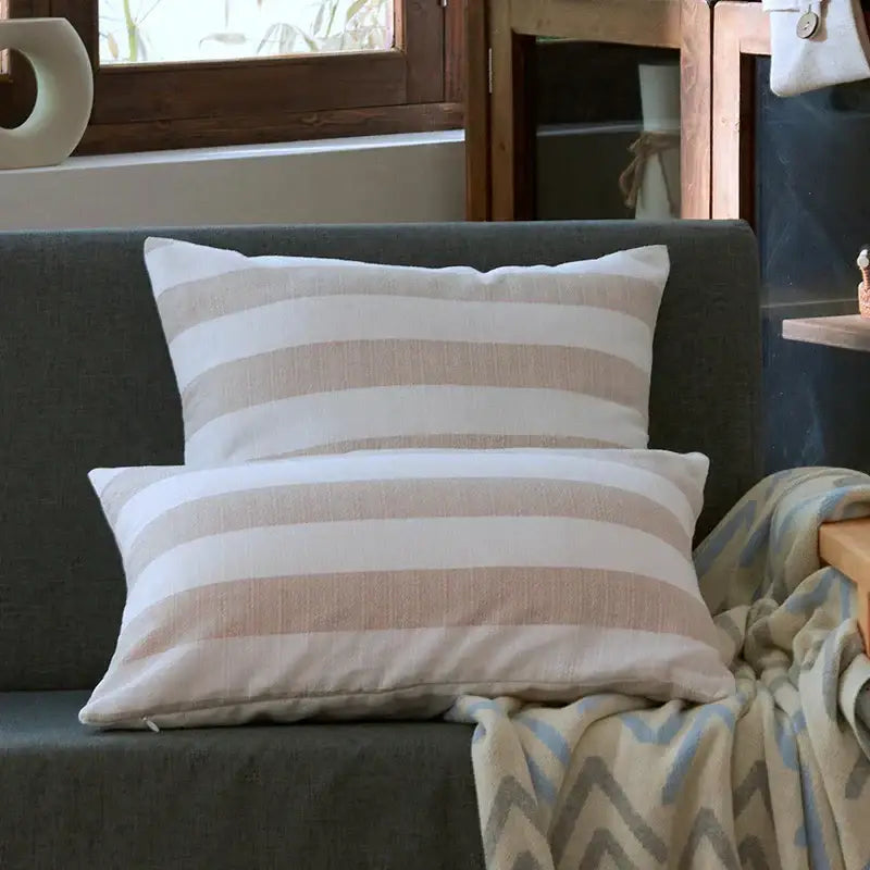 Two beige and off-white linen stripe cushion covers with horizontal stripes for living room decorbites linen stripe pillow