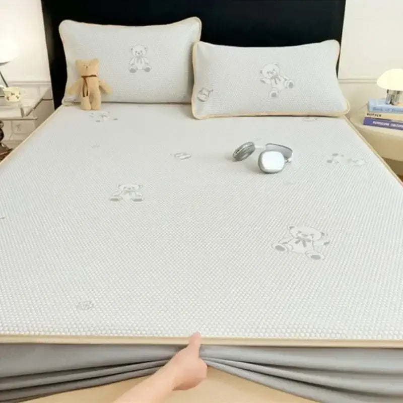 Light gray textured jacquard cooling mat with embroidered little bear patterns for bedroom mattress cooling mat