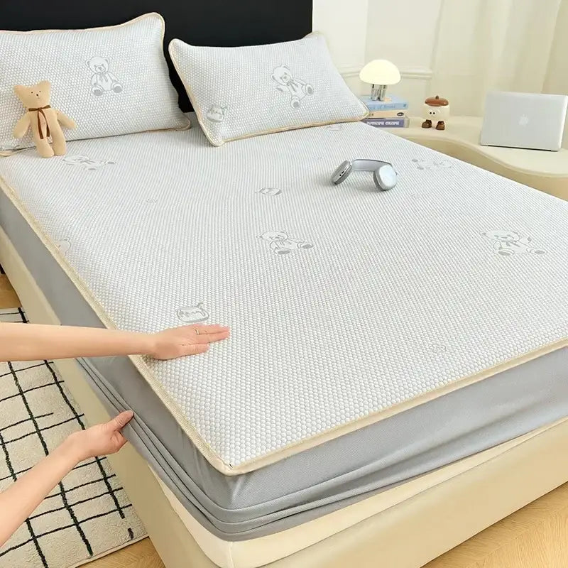 Light gray jacquard cooling mat mattress pad with bear embroidery for a comfortable cooling mat bedroom use