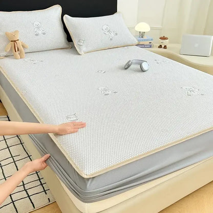Light gray jacquard cooling mat mattress pad with bear embroidery for a comfortable cooling mat bedroom use