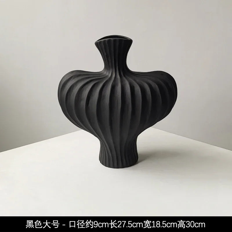 Livetai wabi-sabi sleek black ceramic vase with ribbed texture and organic shape for modern boho living room decor