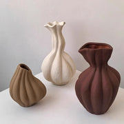 Three earthy toned ribbed ceramic vases from livetai wabi sabi collection for modern boho living room decor