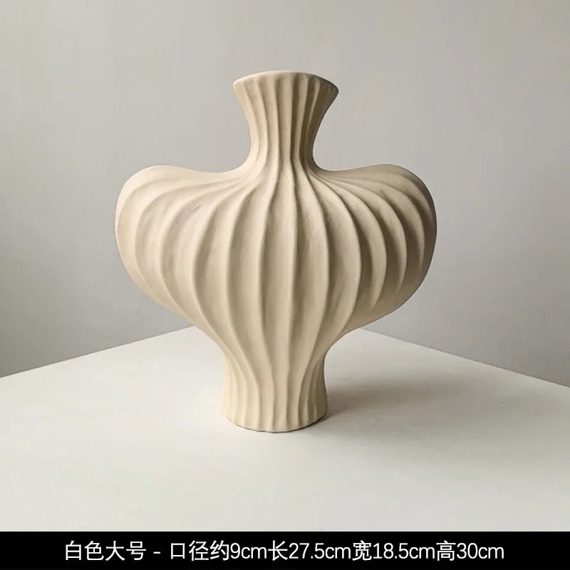 Cream-colored livetai wabi-sabi handmade ceramic vase with ribbed design and asymmetrical form for modern boho decor