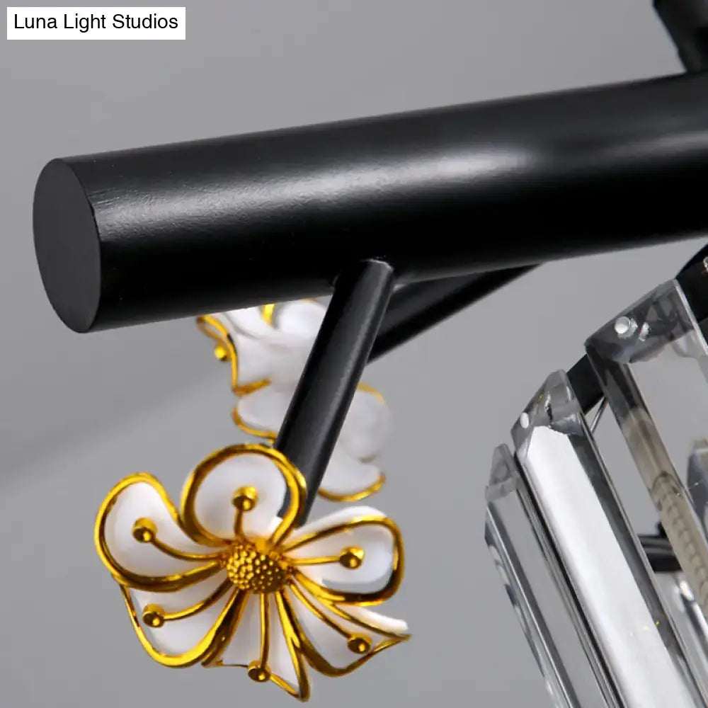 DecorBites™ black island pendant light with clear crystal cylinder and white gold floral pendant light detail