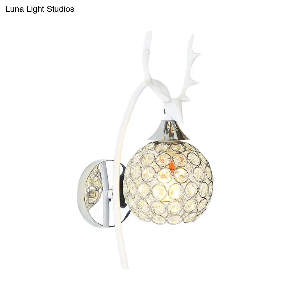 Lodge white and chrome deer wall sconce with a crystal dome shade wall light for bedroom decor