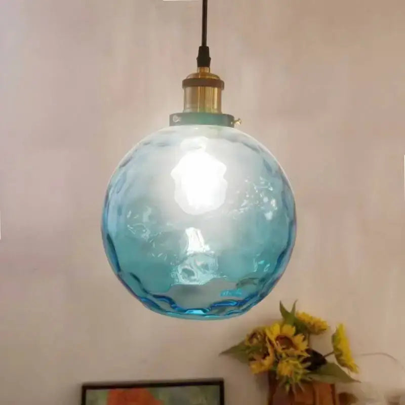 Loft blue glass pendant light with textured bubble surface and brass fixture perfect for kitchen decorbites loft blue