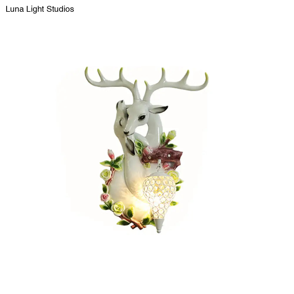 DecorBites™ Loft Style Wall Mounted Sconce with Clear Crystal Shade, Blue/Gold Finish and Deer Head Accent