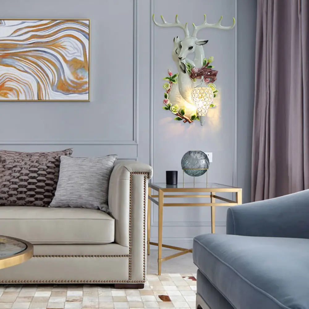 DecorBites™ Loft Style Wall Mounted Sconce with Clear Crystal Shade, Blue/Gold Finish and Deer Head Accent