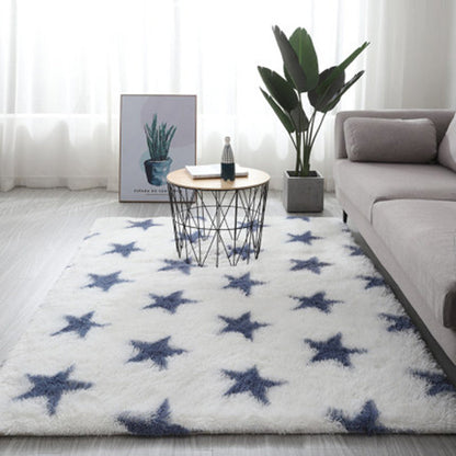 White star rug with blue stars, plush material, modern design.