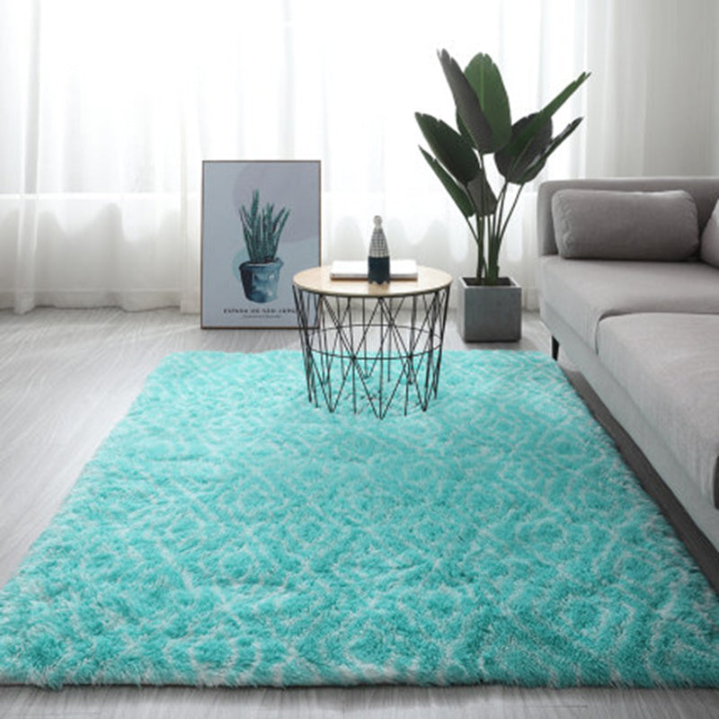 Teal long hair tie-dyed gradient carpet with polyester fiber textured shaggy pile for living room or bedroom use