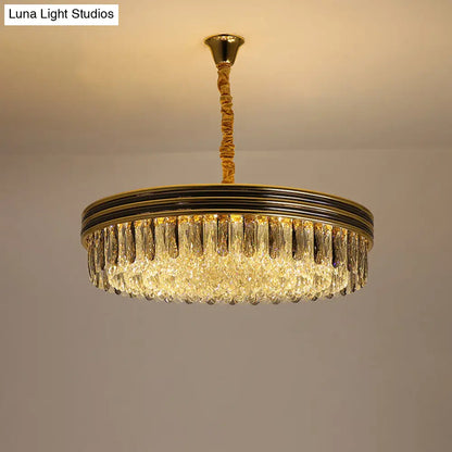 Lámpara de techo Loop para salón: elegante diseño de bloques de cristal con 14 bombillas en acabado dorado.