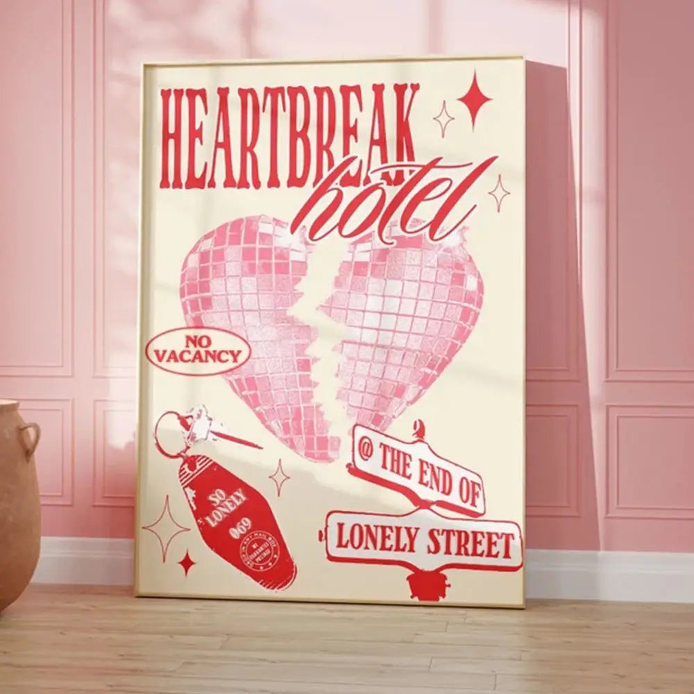 Cream-colored framed wall art canvas featuring a kind love quote with a pink broken disco ball and vintage decor elements
