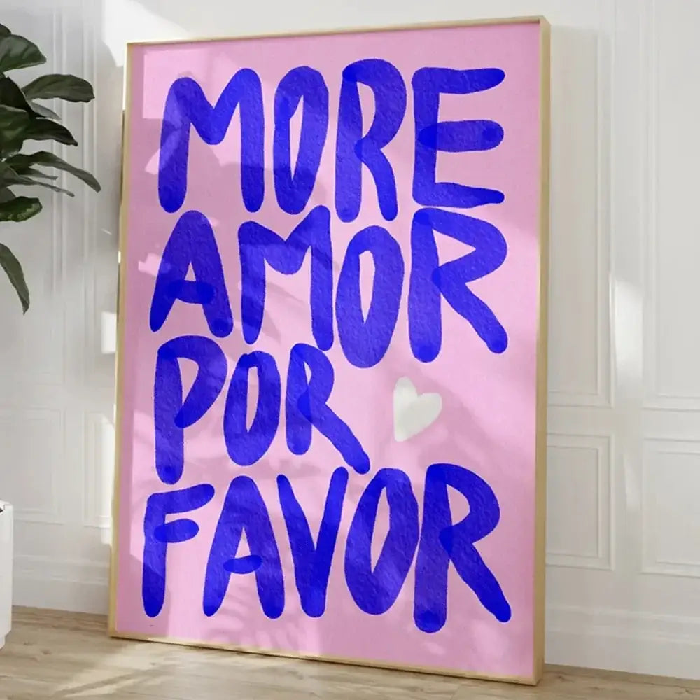 A DecorBites wall art canvas with bold blue brushstroke love quote on soft pink background featuring a white heart