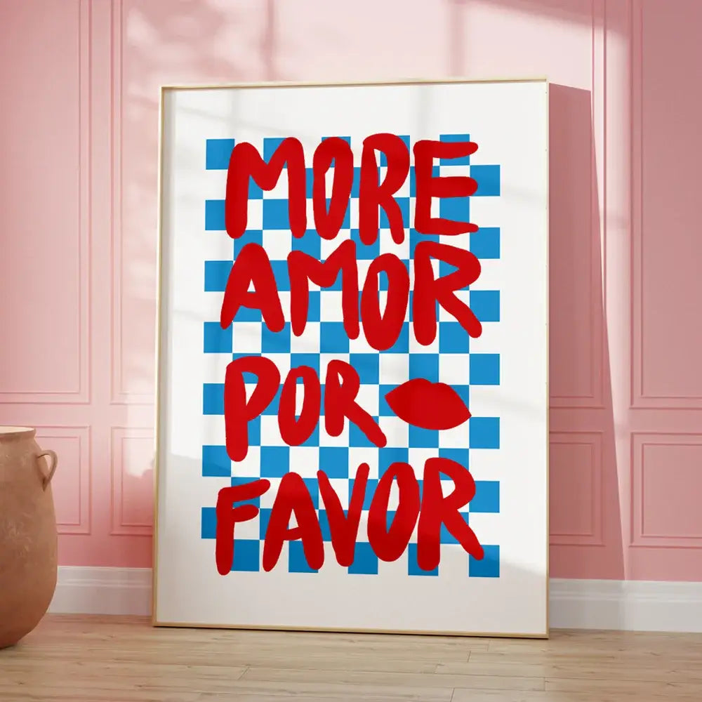 A framed DecorBites wall art canvas with a bold red kind love quote on a blue and white checkered background