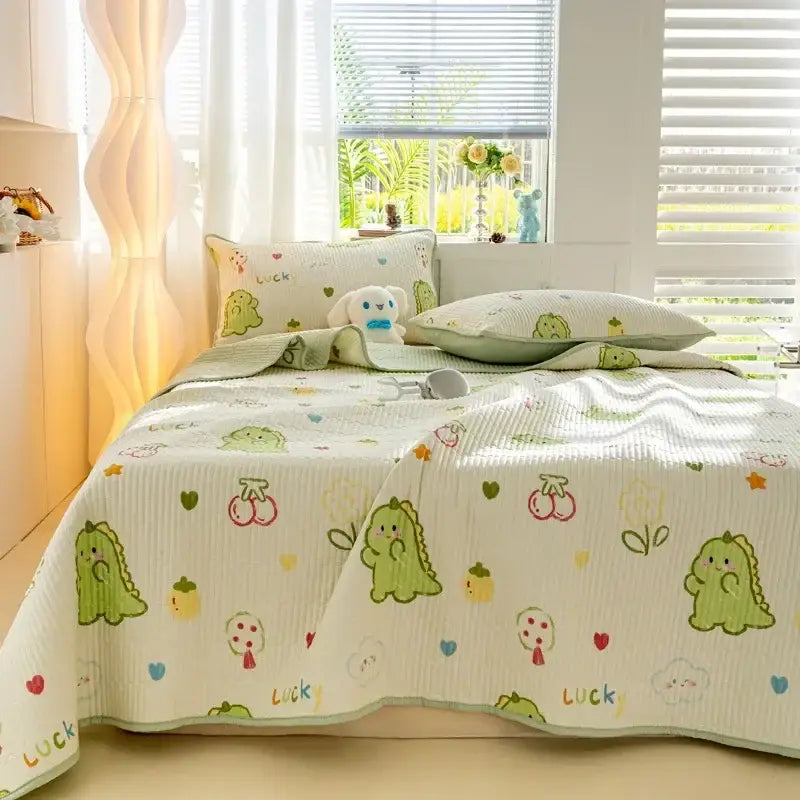 Cute green dinosaur-themed cartoon pattern cotton mattress mat with soft ribbed texture and playful cherry and heart decorbites cartoon pattern