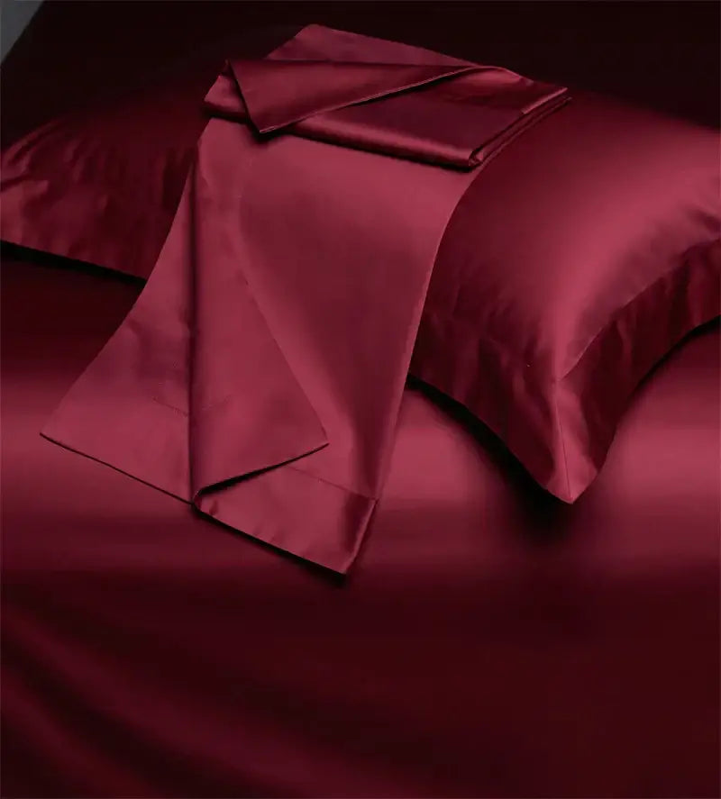 Luxe burgundy red egyptian cotton bedding set with smooth glossy satin finish for elegant bedroom decor