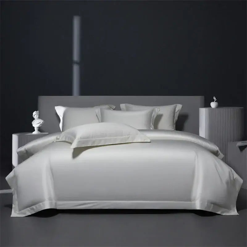 White satin linens and matching pillows in a luxe burgundy red egyptian cotton bedding set for bedroom use