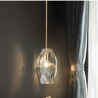 Luxe faceted gold crystal glass pendant lamp with a gold-toned chain for kitchen or bedroom decorbites crystal glass pendant