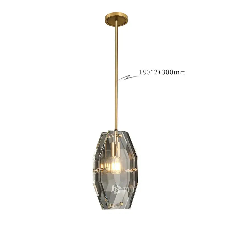 Luxe faceted gold crystal glass pendant lamp with brass rod and clear panels refracting warm light for kitchen and bedroom decorbites crystal glass pendant
