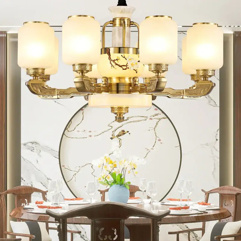 A luxe gold and frosted glass jade chandelier with intricate floral designs for elegant living room decorbites jade chandelier