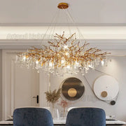 Luxe gold branch crystal led chandelier with dangling crystal droplets for elegant living room lighting