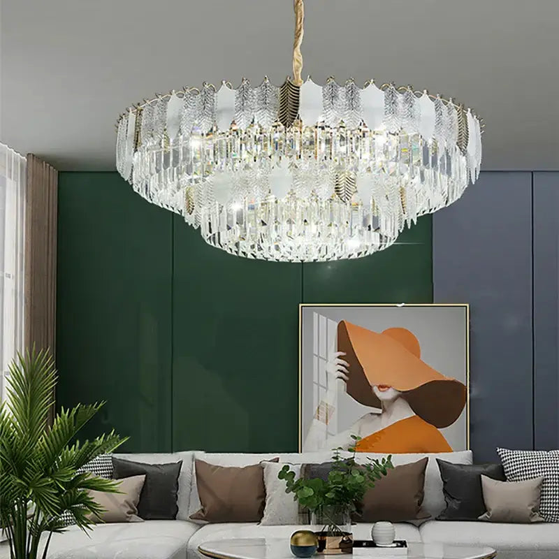 Luxe gold crystal indoor chandelier with leaf accents and cascading crystals for elegant decorbites crystal indoor lighting