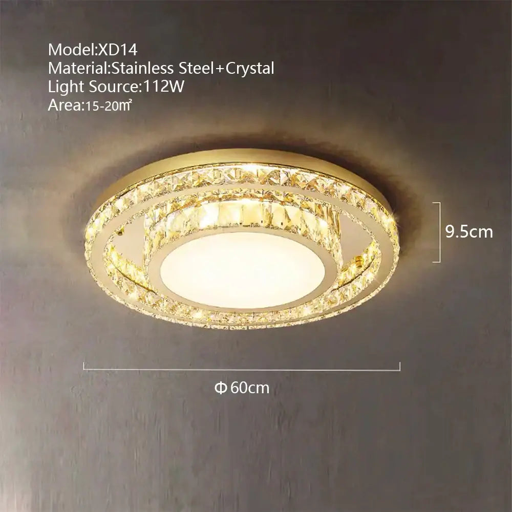 Luxe gold crystal led ceiling chandelier with faceted crystal rings and central diffused led panel for dining room decorbites crystal led