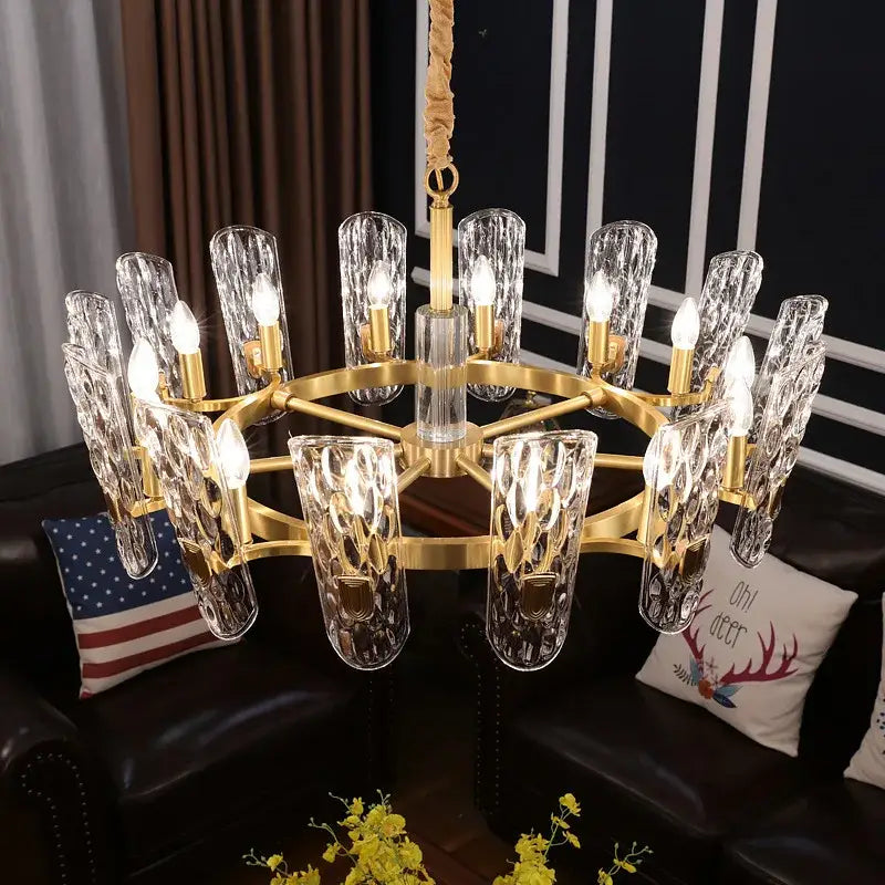 Luxe gold glass led ceiling chandelier with textured clear glass shades and multiple illuminated bulbs for living room
