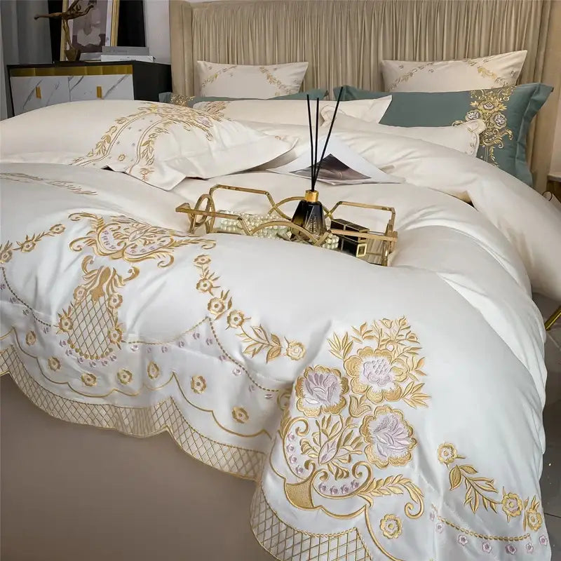 Luxe ivory bedding set with white satin fabric and intricate gold and lavender embroidery from decorbites 1000tc egyptian