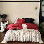 Luxe red and white egyptian cotton lace bedding set with ruffled edges and delicate floral embroidery for bedroom use