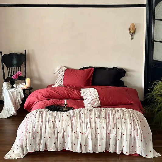 Luxe red and white egyptian cotton lace bedding set with ruffled edges and delicate floral embroidery for bedroom use