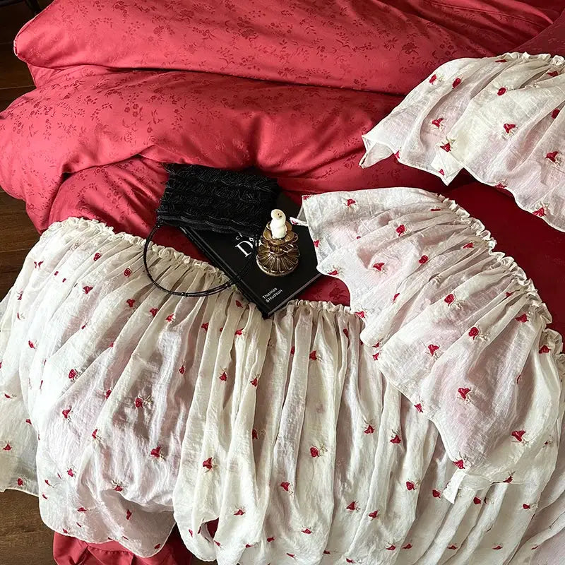 White ruffled dress with red heart embroidery featuring lace ruffles in a luxe egyptian cotton lace bedding set bedroom