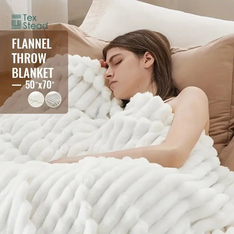 Luxe ribbed white flannel throw blanket featuring a plush textured knit pattern for bedroom plush decor