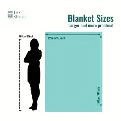 A teal throw blanket from tex stead shown with dimensions next to a person for size comparison in bedroom decor