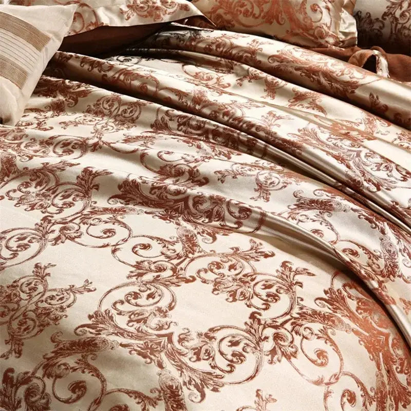 Cream-colored satin duvet cover with intricate brown damask patterns in a decorbites jacquard satin luxury bedding set