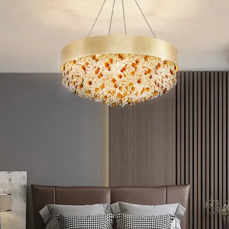Luxurious decorbites circular crystal chandelier with gold tone and cascading amber and clear crystal beads pendant light