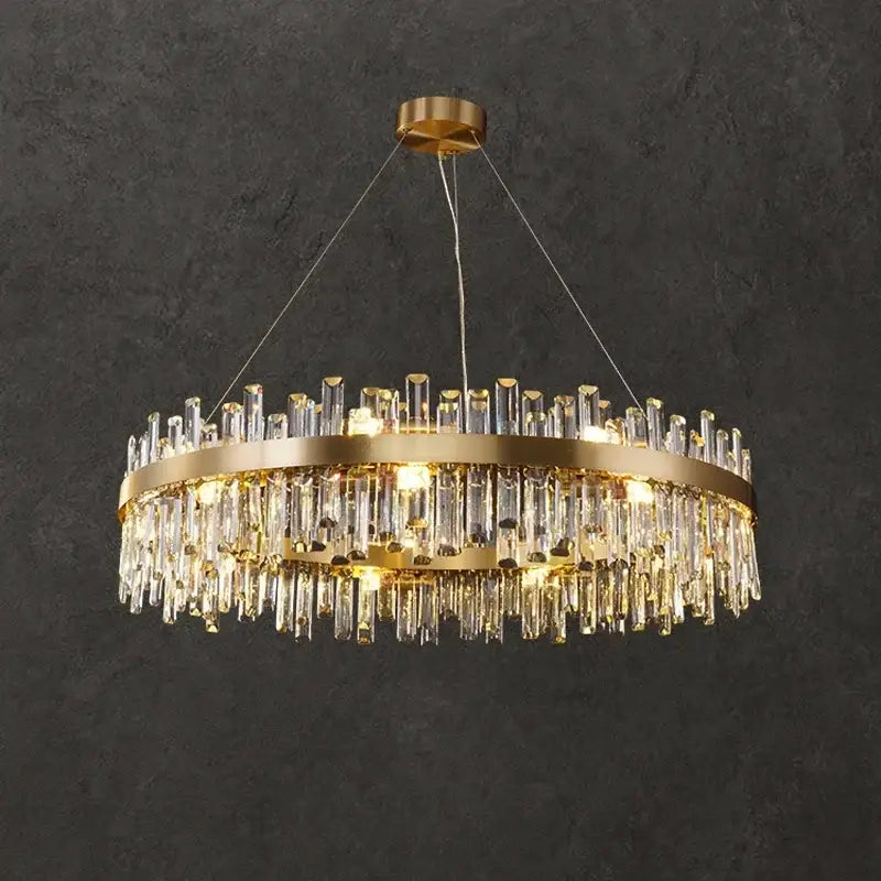 Luxurious gold crystal led chandelier with clear crystal prisms hanging from a circular frame for living room use