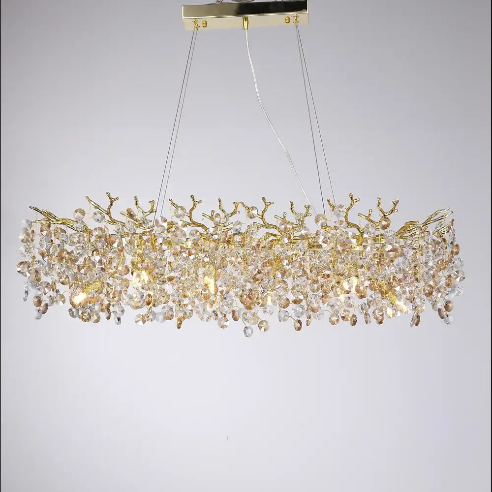 Luxurious gold crystal sunflower branch chandelier with intricate metalwork and cascading clear and amber crystals for dining room decorbites crystal sunflower