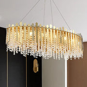 Gold-toned 14-light elliptical island pendant light fixture with vertical metallic bars and cascading clear crystal beads
