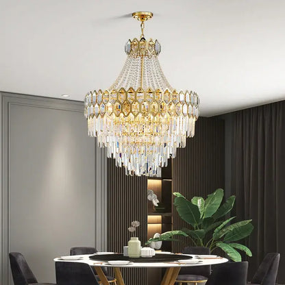 Luxurious gold hexagonal pendant lamp with cascading deluxe crystal led prisms for elegant dining room decorbites deluxe crystal