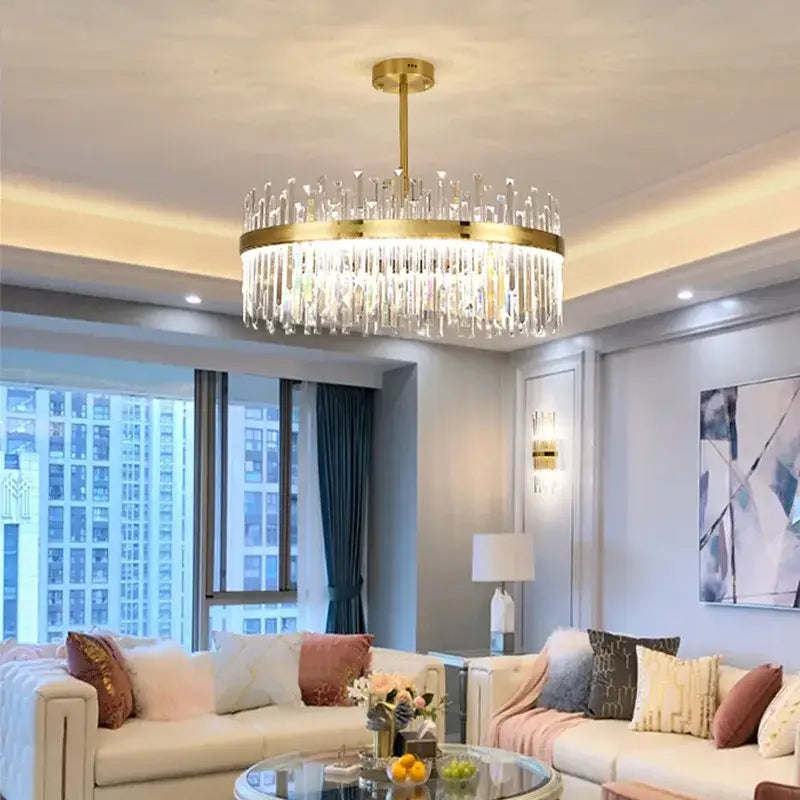 Luxurious gold round crystal pendant light with cascading crystal prisms for living room decorbites gold round design