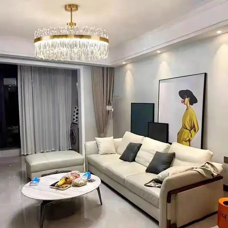Luxurious gold round crystal pendant light with cascading crystal droplets for elegant living room decorbites gold round design