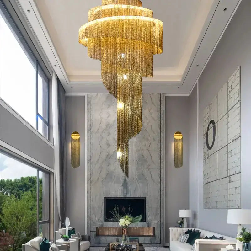 A cascading gold and silver aluminum chain chandelier with tiered spiral design and embedded lights for living room use