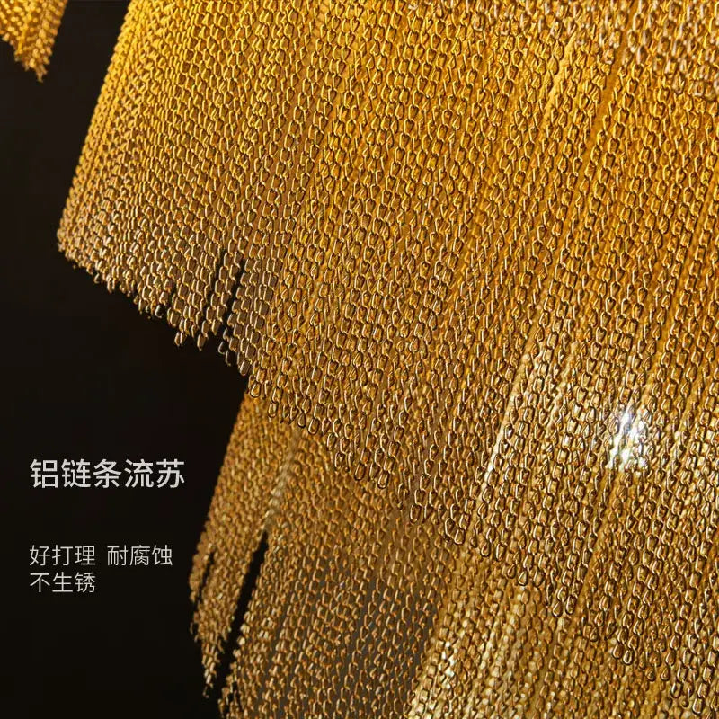 Golden aluminum chain tassel fringe with shimmering interlocking mesh design for luxurious chandelier lighting