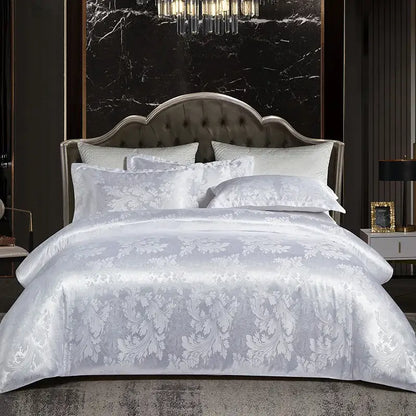 Elegant white satin duvet cover with silver floral damask pattern and matching pillows in decorbites jacquard satin bedding set