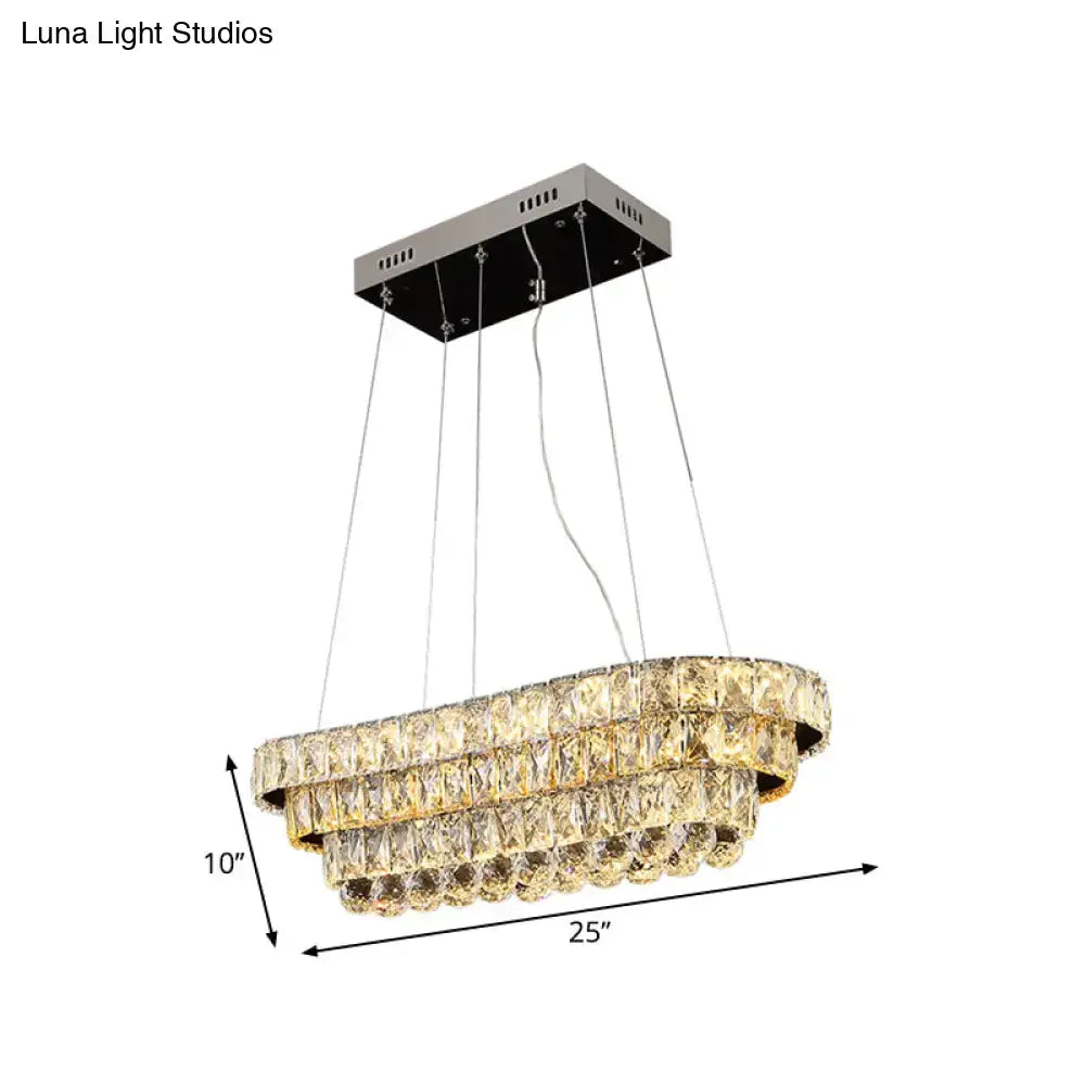 Decorbites™ contemporary chrome pendant light with tiered crystal design suspended by metal chains for restaurant hanging