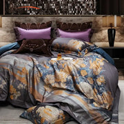 Luxurious gray and gold floral satin bedding set with matching pillows made from decorbites jacquard egyptian cotton