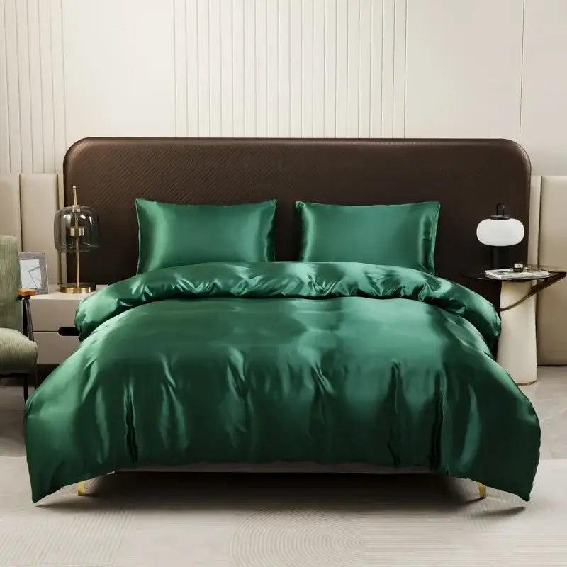 Emerald green satin duvet cover and pillowcase set with smooth glossy finish and elegant draping by decorbites ice rayon