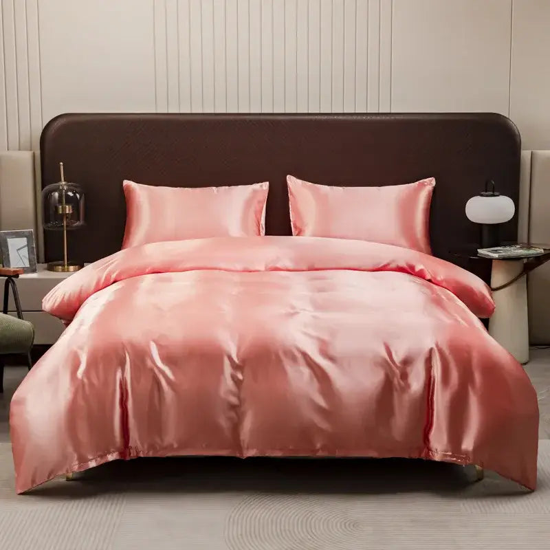 Luxurious peach satin duvet cover and pillowcase set in pink featuring decorbites ice rayon material for stylish bedding