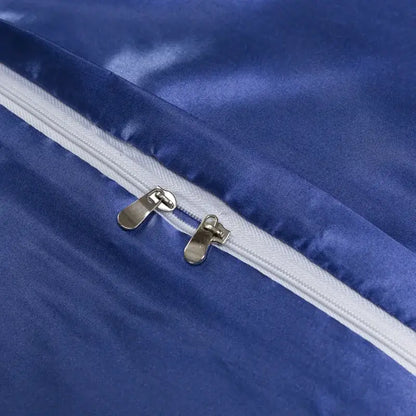 Luxurious royal blue satin duvet cover with white zipper and silver slider pulls in decorbites ice rayon pillowcase set